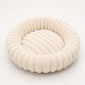 Nestwell – Raised-Edge Round Calming Plush Pet Bed