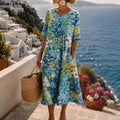 Soleia – Watercolor print flowing midi dress with pockets