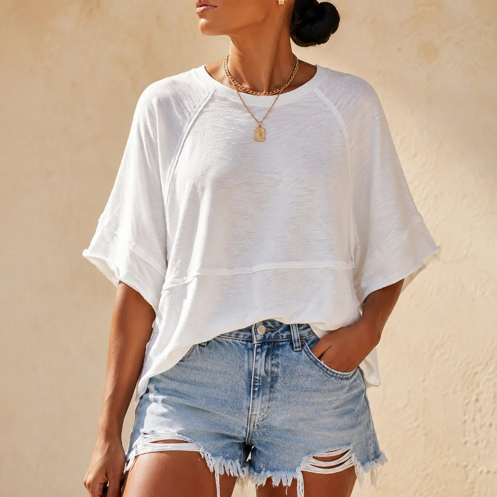 Wearlyn – Oversized Split-Hem T-Shirt with Flared Sleeves