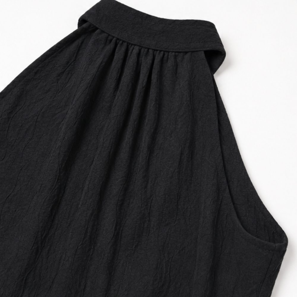 Draplyn – The 2-Piece Halter That Skims, Not Swallows