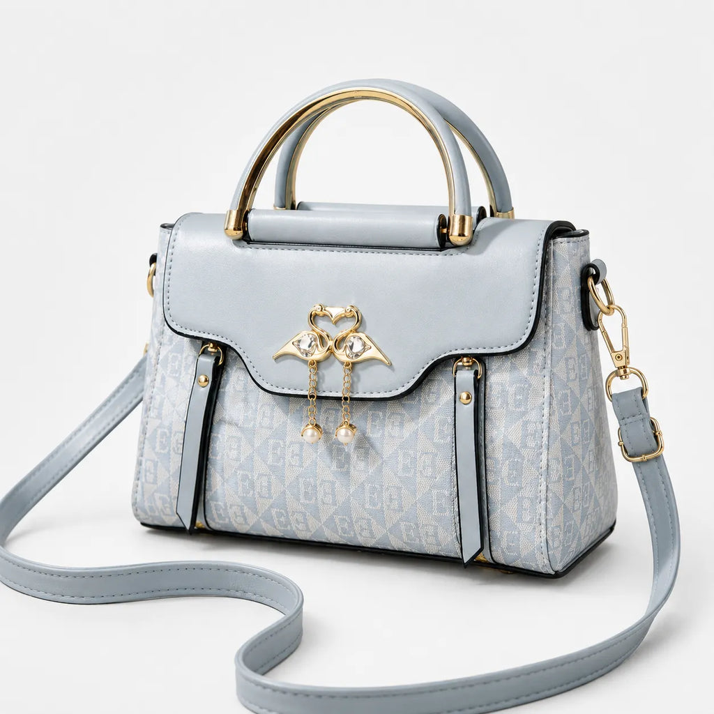 Velora – Swan-Clasp Structured Crossbody Bag with Gold Hardware