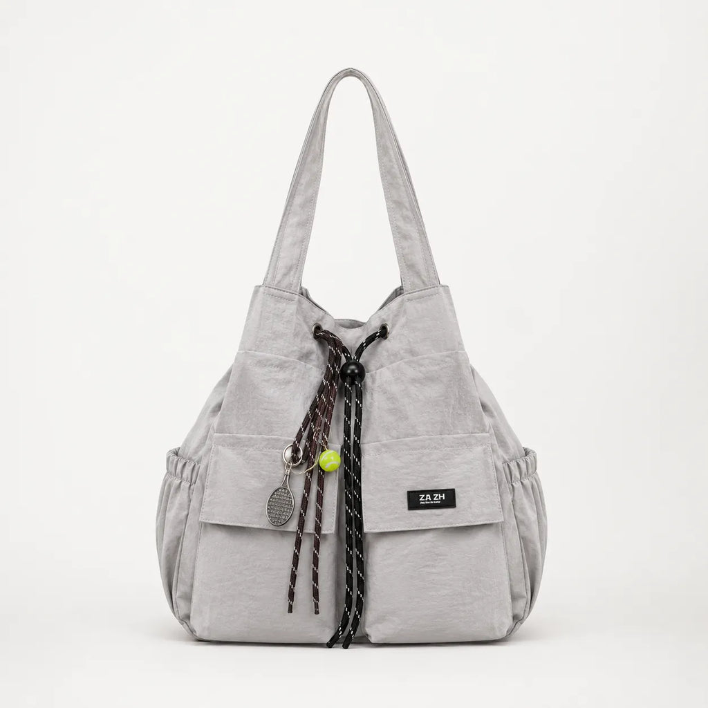 Carryall – Convertible Drawstring Canvas Tote Backpack with Cargo Pockets
